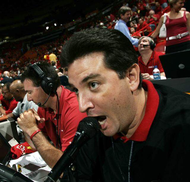Michael Baiamonte, "the voice of the Heat", announces the Miami Heat team to the crowd during player introductions of the Heat's playoff game against Washington at then-AmericanAirlines Arena in 2005.